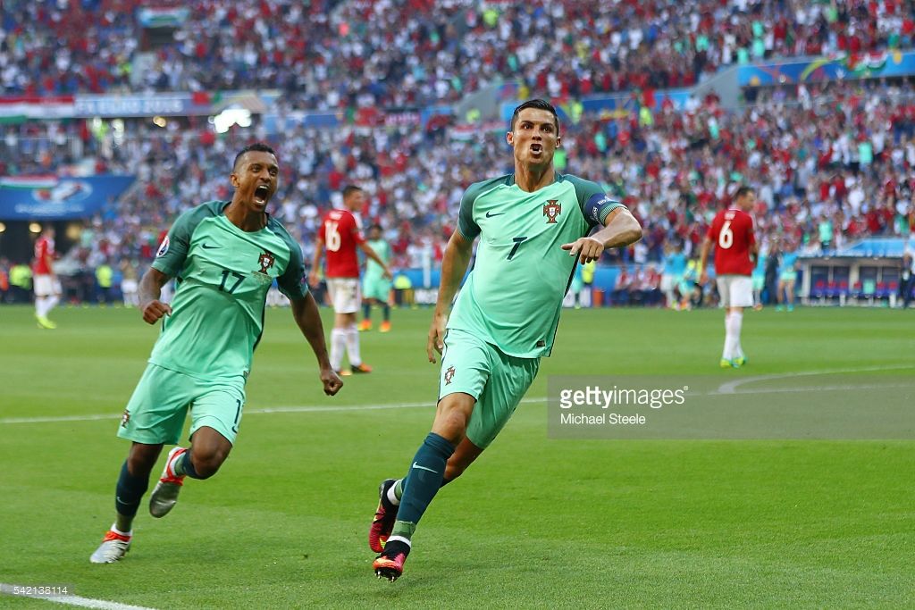  photo Cristiano Ronaldo R of Portugal celebrates scoring his teams second goal with his team mate Nani L during the UEFA EURO 2016 Group F match between Hungary and Portugal.jpg